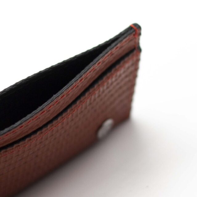 Saint-Lazare - Porte-cartes rouge en lance à incendie