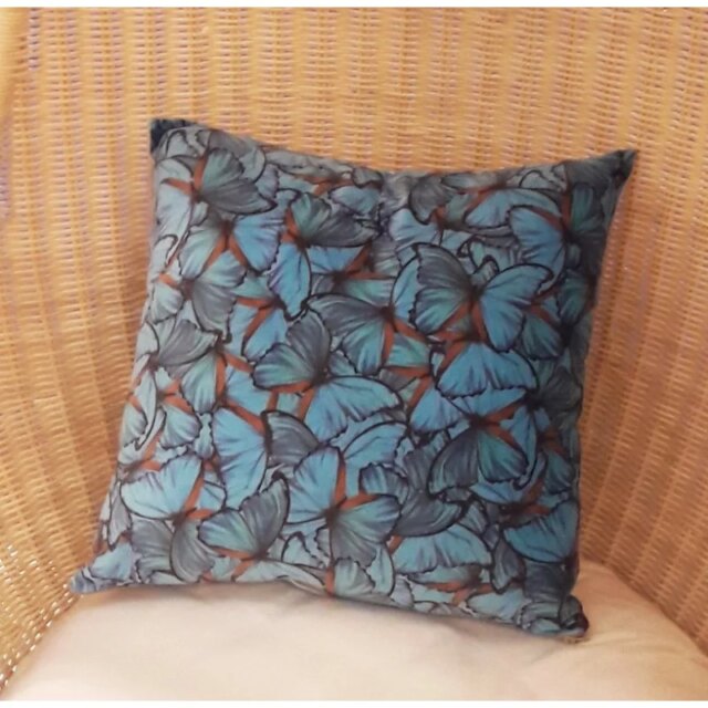 Fleur de Soleil - Coussin velours papillons turquoise
