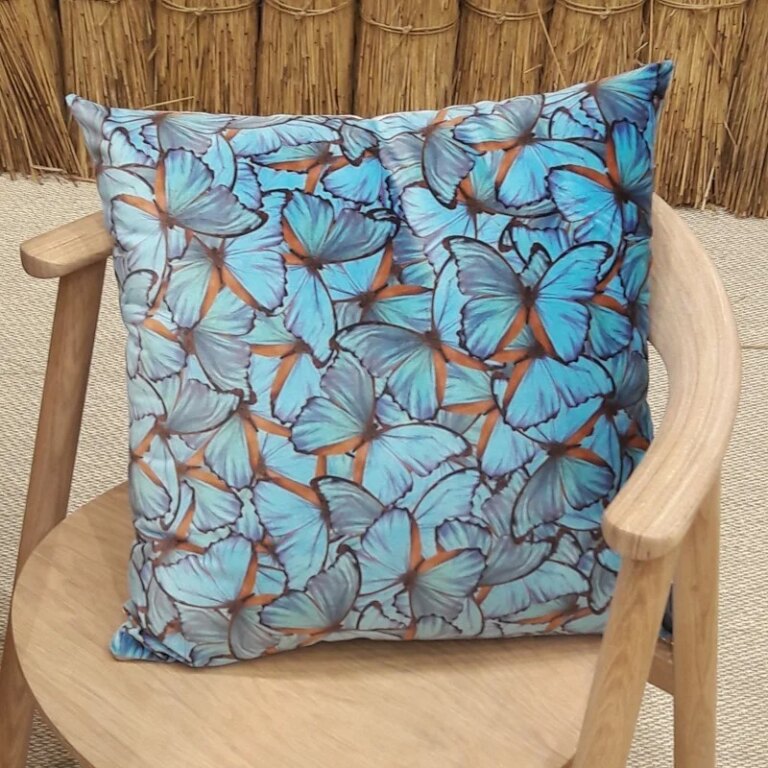 Fleur de Soleil - Coussin velours papillons turquoise