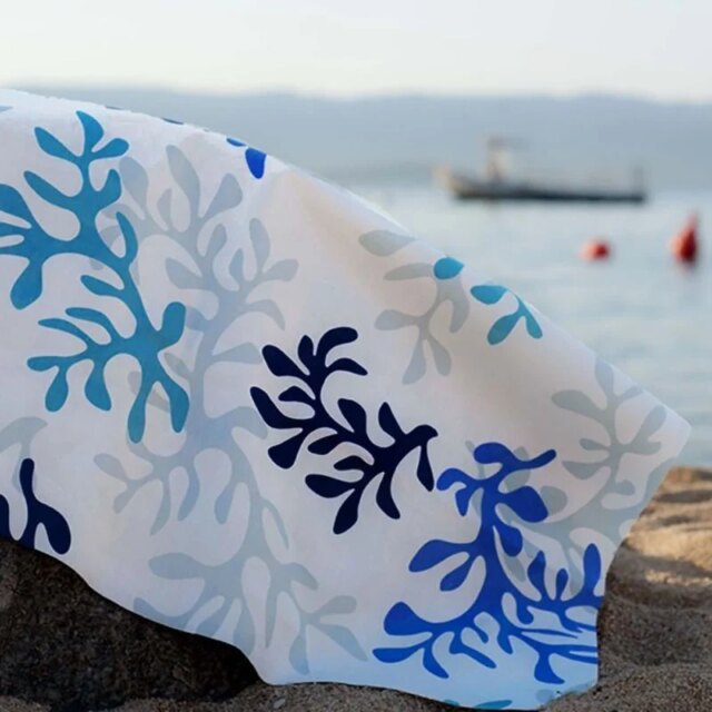 Fleur de Soleil - Nappe enduite Corail bleu
