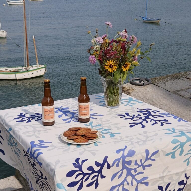 Fleur de Soleil - Nappe enduite Corail bleu