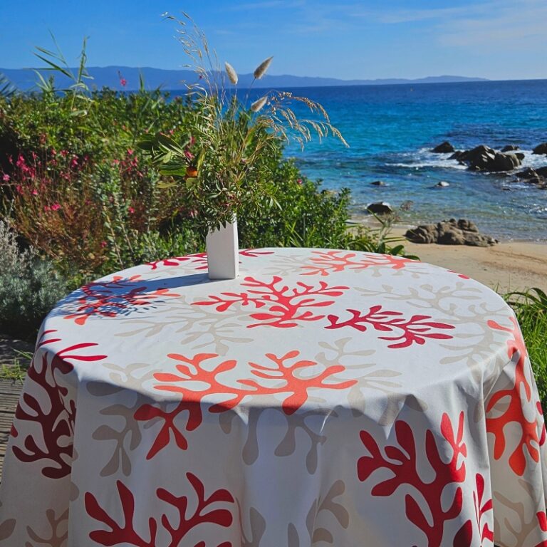 Fleur de Soleil - Nappe enduite ronde ou ovale Corail rouge