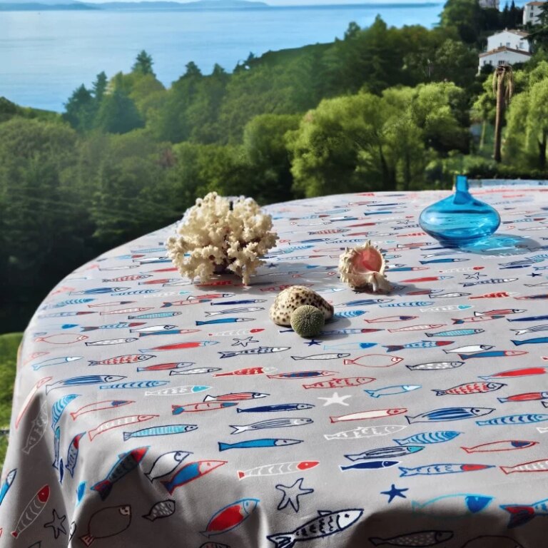 Fleur de Soleil - Nappe enduite ronde ou ovale Poissons bleus rouges