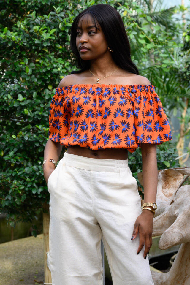 Nevice - Top epaule denude orange fleurie