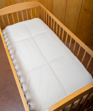 Ardelaine - Surmatelas Douceur en laine pour lit bébé