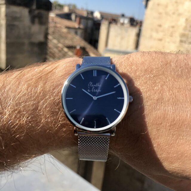 Menthe à l'eau - Coffret Montre Mixte L'Indécise maille chromée fond bleu + façon cu