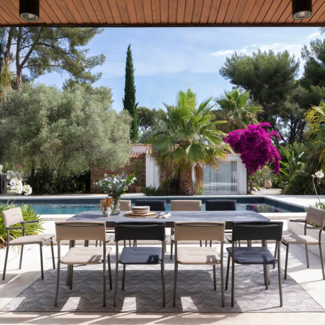LAFUMA Mobilier - Ensemble LAFUMA MOBILIER table de repas extensible et 6 fauteuils de jardin Oron HPL 6-8 personnes GRIS CIMENT