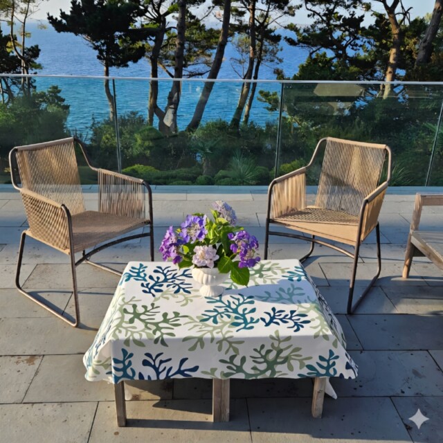 Fleur de Soleil - Nappe enduite Corail vert