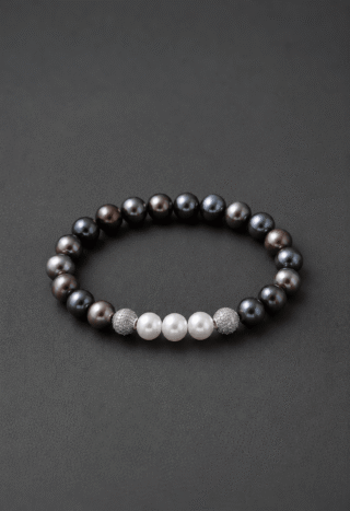 Bracelet Eclipse Perles d’eau douce noires et Or Blanc par la marque NEIJE NEIJE - Bracelet Eclipse Perles d’eau douce noires et Or Blanc