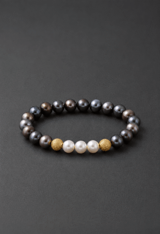 Bracelet Eclipse Perles d’eau douce noires et Or Jaune par la marque NEIJE NEIJE - Bracelet Eclipse Perles d’eau douce noires et Or Jaune
