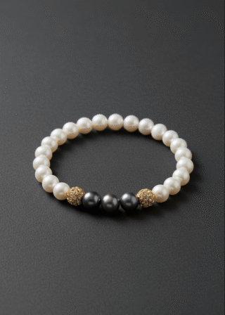 Bracelet Eclipse Perles d’eau douce & Perles Noires – Or Jaune par la marque NEIJE NEIJE - Bracelet Eclipse Perles d’eau douce & Perles Noires – Or Jaune