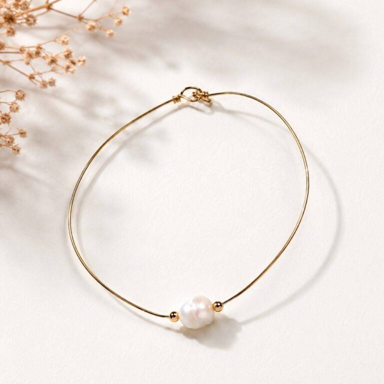 Maison Mallow - Bracelet Bow en gold filled 14K et perle d'eau douce baroque – L